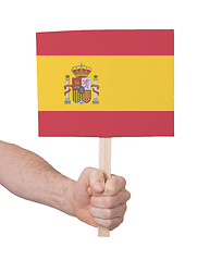 Image showing Hand holding small card - Flag of Spain