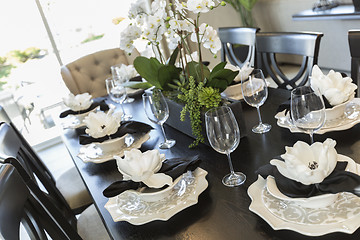 Image showing Abstract of Dining Table with Place Settings