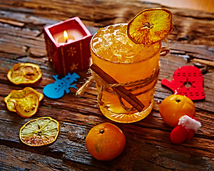 Image showing Fresh juice of ripe mandarins in glass.
