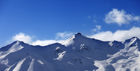 Image showing Panoramic view on snowy sunlight mountains