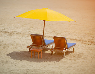 Image showing Two chairs on a tropical beach