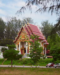 Image showing Thai temple amoungst trees 