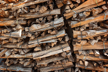 Image showing Stacked dried and tied firewood