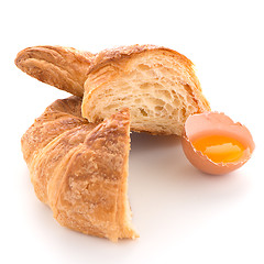 Image showing Croissant and raw egg