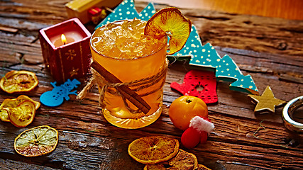 Image showing Fresh juice of ripe mandarins in glass.