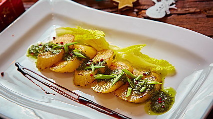 Image showing appetizer of grilled celery with greens