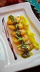 Image showing appetizer of grilled celery with greens 