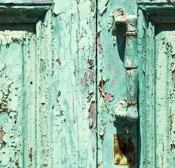 Image showing spain canarias brass r in a green closed wood  door abstract 