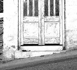 Image showing blue door in antique village santorini greece europe and    whit