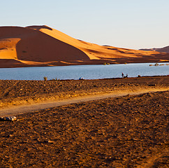 Image showing sunshine in the lake yellow  desert of morocco sand and     dune