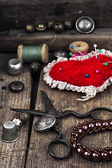 Image showing pin cushion and sewing tools