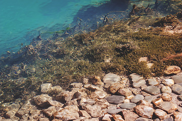 Image showing A fragment of the rocky bottom of a mountain lake.