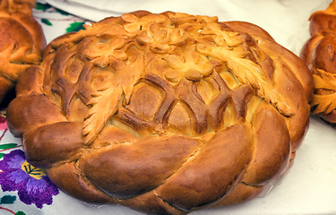 Image showing Beautiful cake on a white towel. Sold at the fair.