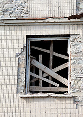 Image showing Boarded window of old house