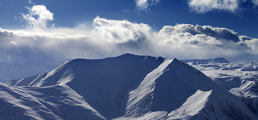 Image showing Panoramic view on snow mountains in nice evening.