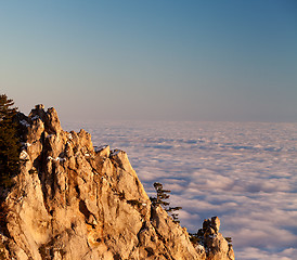 Image showing Evening rocks and sea in clouds