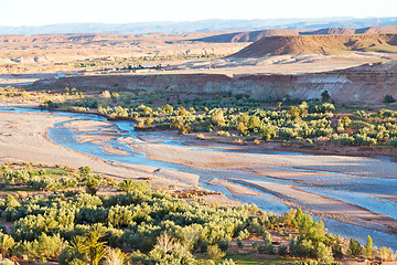 Image showing sunset in africa old near   river blue