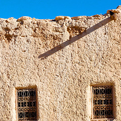 Image showing   yellow window in morocco africa old construction and brown wal