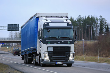 Image showing Volvo FH Semi Moving along Highway