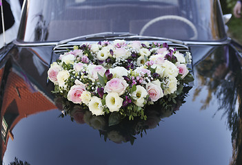 Image showing Roses on wedding car