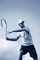 Image showing male tennis player in action