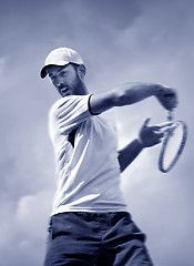 Image showing male tennis player in action 