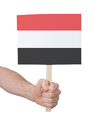 Image showing Hand holding small card - Flag of Yemen