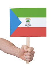 Image showing Hand holding small card - Flag of Equatorial Guinea