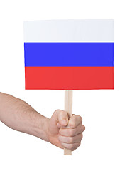 Image showing Hand holding small card - Flag of Russia