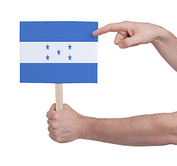 Image showing Hand holding small card - Flag of Honduras