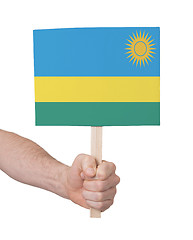 Image showing Hand holding small card - Flag of Rwanda