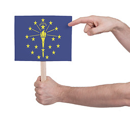 Image showing Hand holding small card - Flag of Indiana