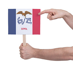 Image showing Hand holding small card - Flag of Iowa