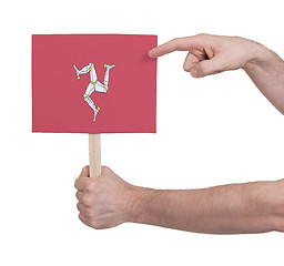 Image showing Hand holding small card - Flag of Isle of man