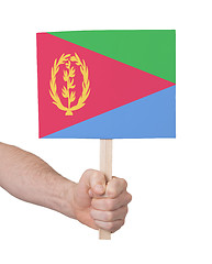 Image showing Hand holding small card - Flag of Eritrea