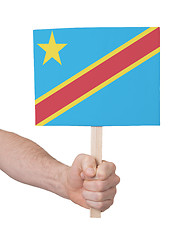 Image showing Hand holding small card - Flag of Congo