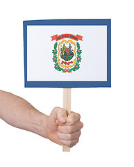Image showing Hand holding small card - Flag of West Virginia