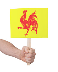 Image showing Hand holding small card - Flag of Wallonia