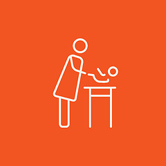 Image showing Mother taking care of baby line icon.