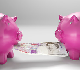 Image showing Piggybanks Eating Money Shows Shared Savings