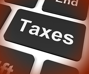 Image showing Taxes Key Shows  Tax Or Taxation