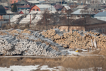 Image showing pile of wood logs on plywood combine. Tyumen