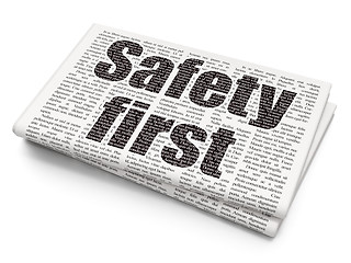 Image showing Protection concept: Safety First on Newspaper background
