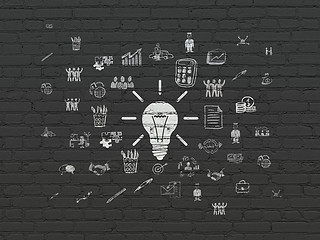 Image showing Business concept: Light Bulb on wall background