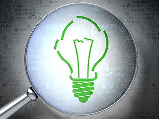 Image showing Business concept: Light Bulb with optical glass on digital background