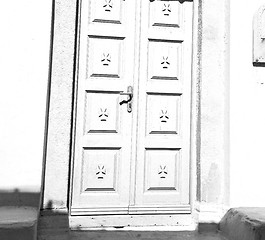 Image showing white  red brown  door in antique village santorini greece europ