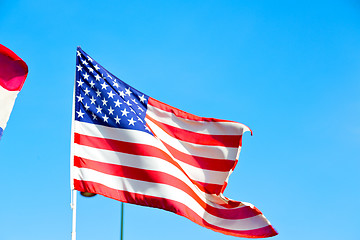 Image showing   waving flag in    colour