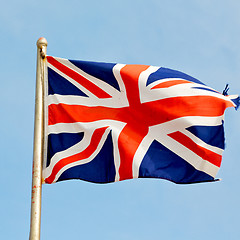 Image showing waving flag in the blue sky british colour and wave