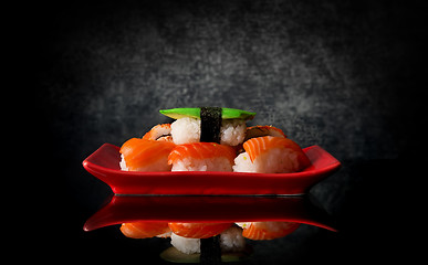 Image showing Sushi on red plate
