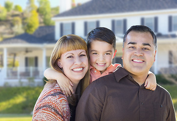 Image showing Happy Mixed Race Young Family in Front of House